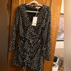 Mini polka dot dress. Likely brand.